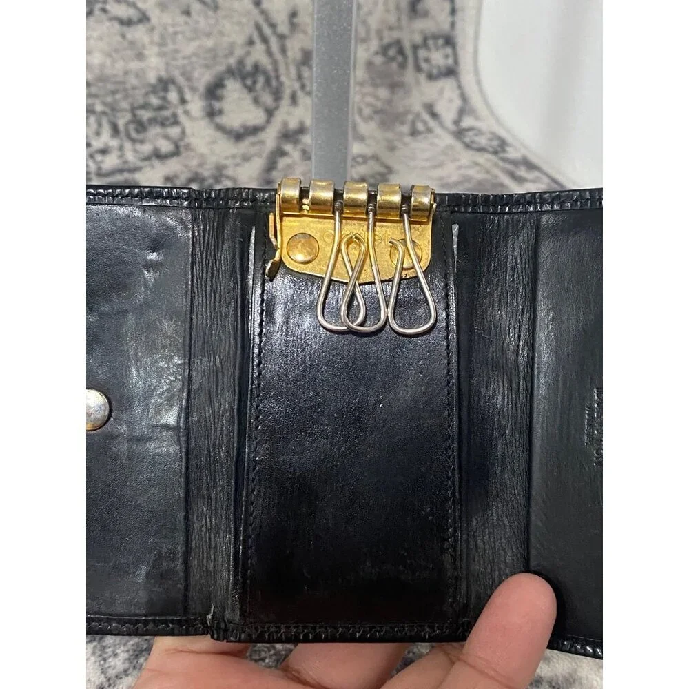 Louis Vuitton Black Epi Leather Key Holder With Gold Hardware And Snap Closure
